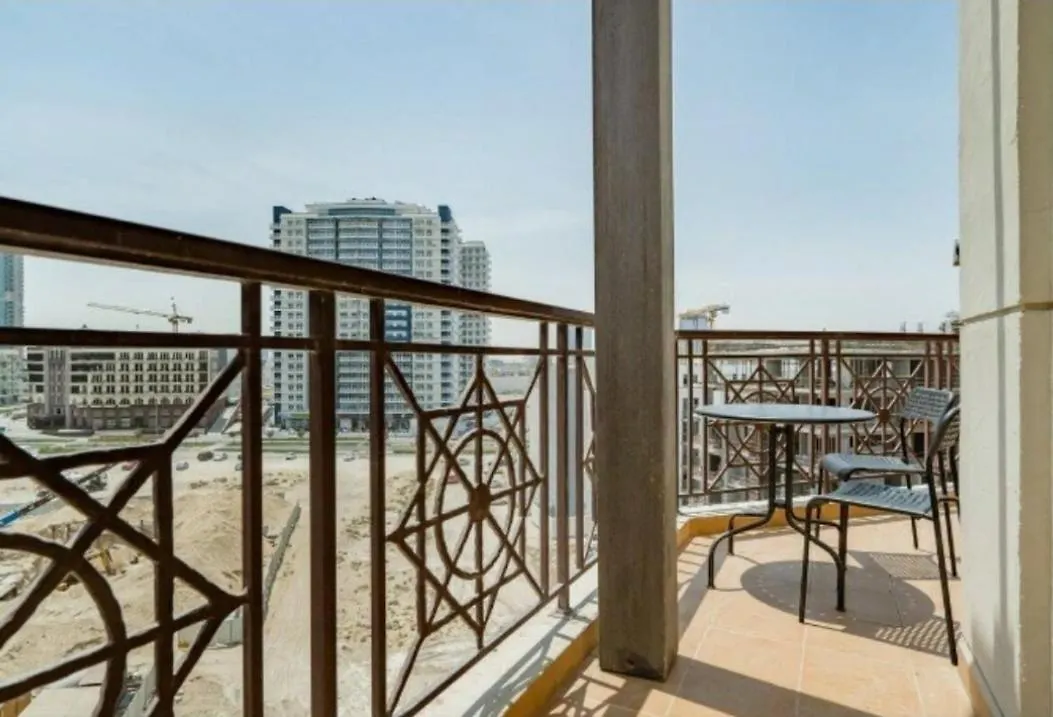 Masters Bedroom With Balcony & Shared Kitchen Dubai Apartment
