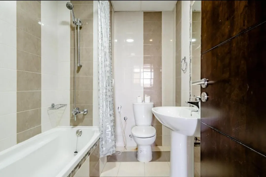 Masters Bedroom With Balcony & Shared Kitchen Dubai Apartment